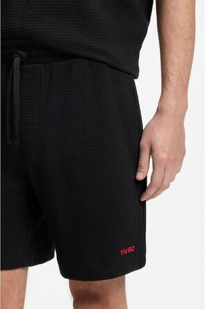 Шкіряний чоловічий ремінь HUGO Geek Sz35 чорного кольору з червоною прошивкою та логотипом на пряжці, розмір XL